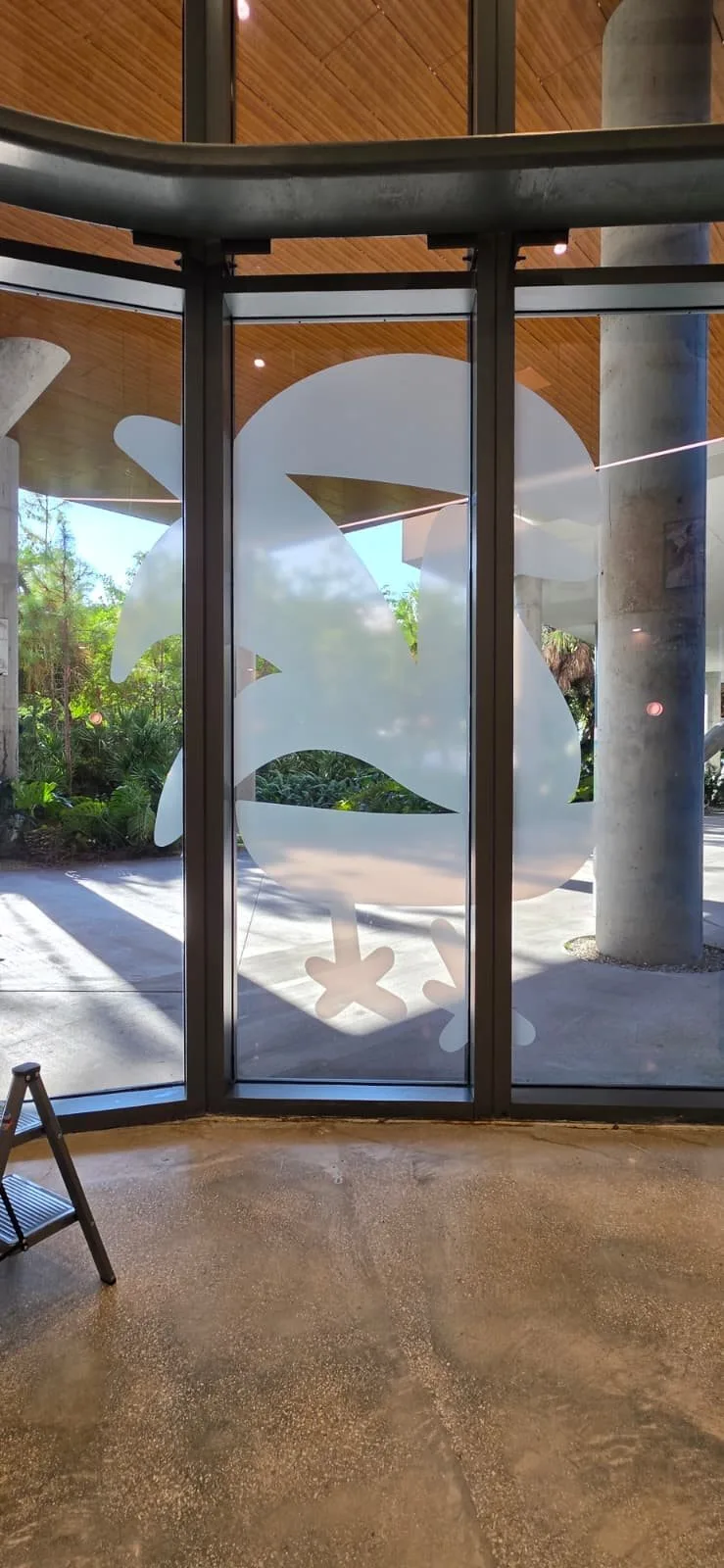 Decorative white graphic applied to a glass window