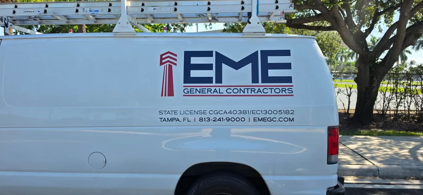 EME lettering on the side of a white van